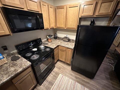Fully furnished kitchen with a Ninja coffee station