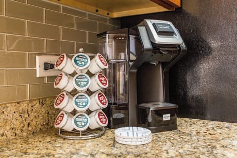 Get caffeinated with our Keurig coffee maker. Tea packets, cream and Splenda are readily available. :)