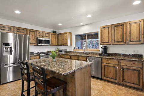 Island with a bar for additional space