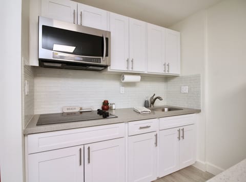 Kitchen, microwave (with oven features), stovetop, sink