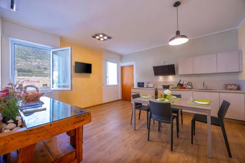 The cozy living room with the dining table