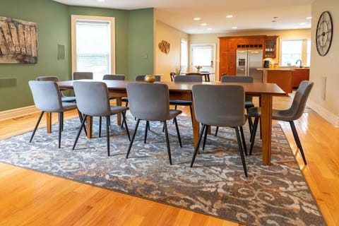 Gather around the grand dining table with space for up to 10 guests