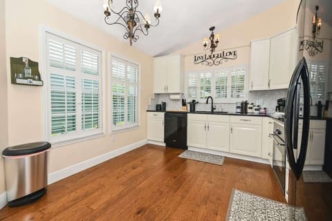 Beautiful, elegant & spacious kitchen stocked with everything you should need (probably a few things you don't)! Pots & pans, silverware, plates, bowls, cups, glasses, coffee mugs, wine glasses, blender, Keurig Duo, spice rack, knives, etc.