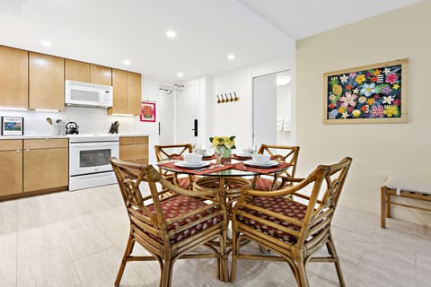 Dine al fresco on the lanai or indoors at this dining table for 4