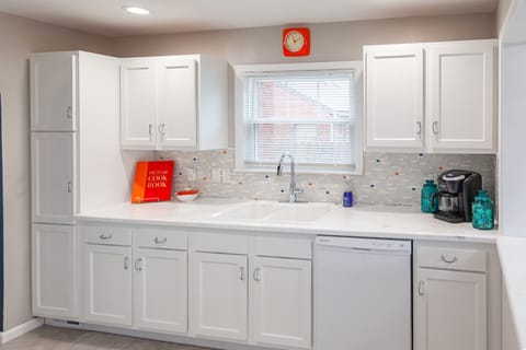 This sunny and spacious mid-century style home is perfect for a couple, family or group of friends. The kitchen is equipped with modern amenities, and vintage touches throughout.