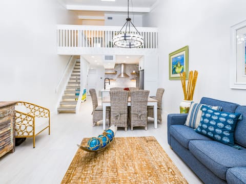Enter to a soaring space made for easy togetherness.