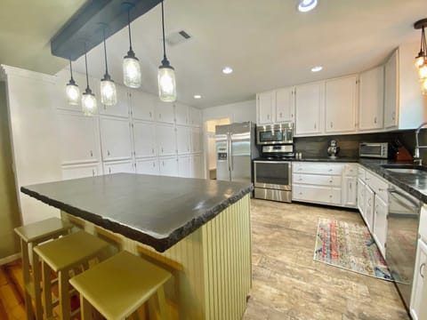 Additional seating at the cozy green island