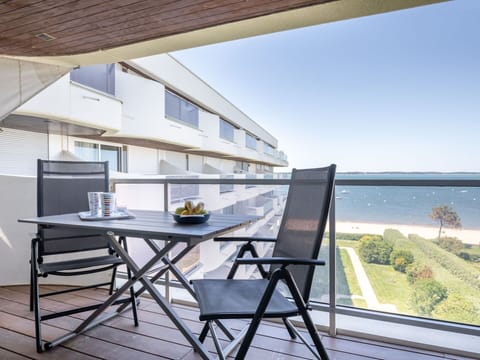 Furniture, Property, Table, Sky, Water, Plant, Shade, Wood, Building, Architecture