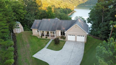 CoHaMa Lake House. Flat front yard with a great view.