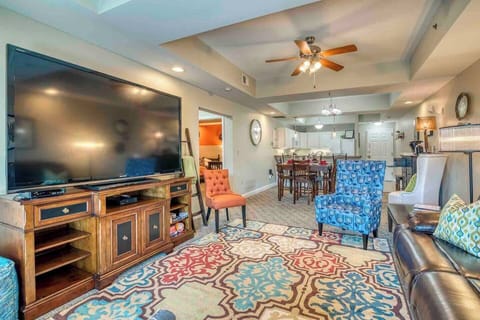 This cozy and serene space features an impressive 85" high-definition television, a comfortable leather recliner sofa, and ample seating options for the family. The TV offers access to popular streaming services such as Netflix, Disney, Hulu, etc.