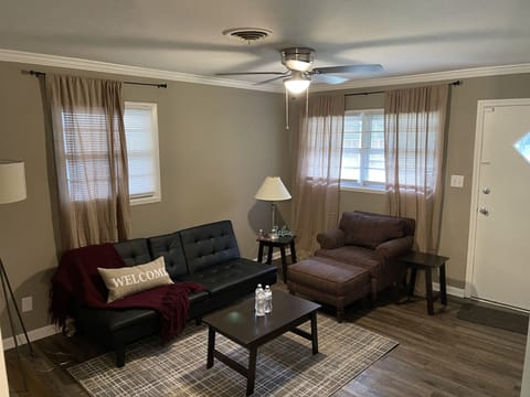 Perfect space to relax or read in oversized chair. Sofa converts to sleeper.