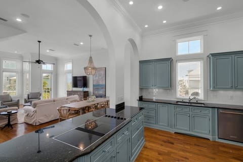 With the large updated kitchen open to the family room, there is no reason anyone in your group ever has to miss out on the fun!