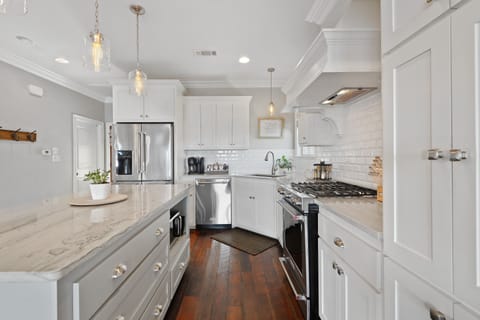 Kitchen equipped with 5 Burner Gas Range. Coffee and seasoning are available