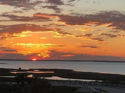 Sunset over West Bay at Pointe West.