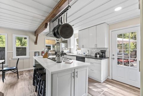 Dining table with seating for 6 and lots of natural light.