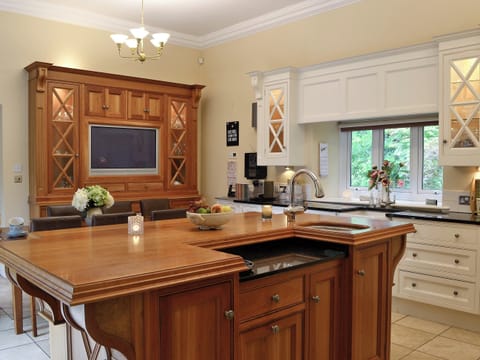 Amazing kitchen/ dining room that is very well equipped and features a large island | The Coach House, Keswick