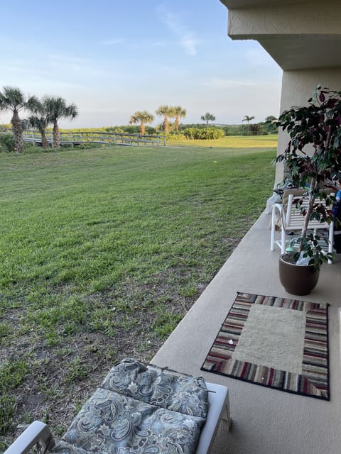 Large back yard, right outside of the living room and leading to the Atlantic
