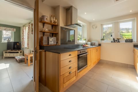 Ground floor: Kitchen with views of the hills