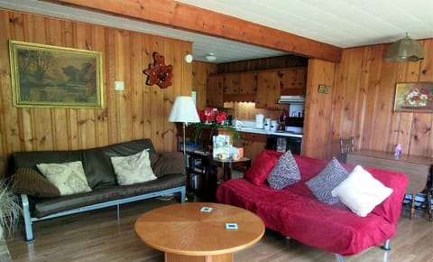 Twin futons both pull out into full size beds with linens in large closet