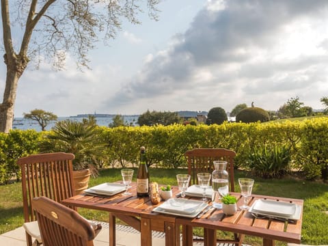 Cloud, Sky, Plant, Table, Furniture, Property, Plant Community, Nature, Outdoor Table, Tree