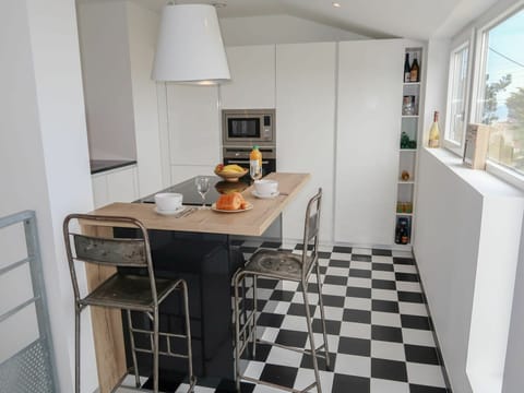 Cabinetry, Furniture, Countertop, Table, Kitchen Stove, Kitchen, Wood, Interior Design, Flooring, Kitchen Appliance