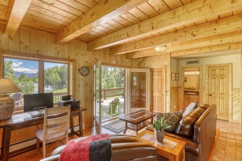 Looking on from the main living area, you have a quaint workstation, powder room and French doors lead to the wide-open private river front. 5 Stars!