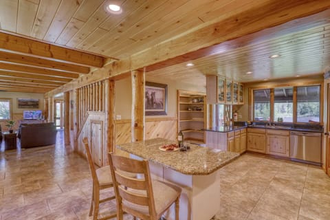 Fully appointed kitchen and pantry make up this open concept family space. Yellowstone Riverside is a 5 star guest favorite! Perfect for Holidays!