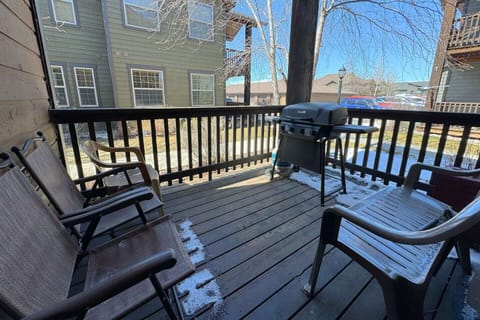 Step out of the living room onto the porch, and make use of the propane BBQ.