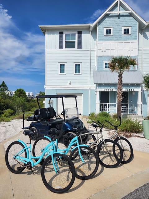 Front of townhouse.  Golf cart and bicycles are included in your stay.