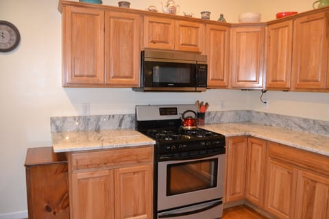 Kitchen - notice the beautiful granite countertops and new appliances.