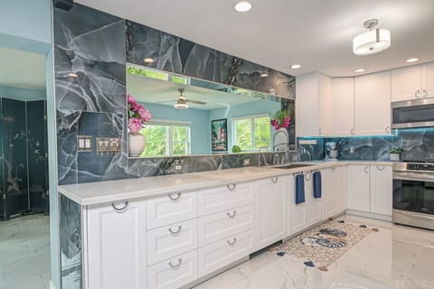 This kitchen is next level.  Soft close cabinets, nearly 40 feet of countertop.