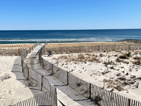 View of walkway to the private beach from master bedroom.  Never crowded. 