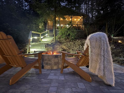 New Outdoor Patio: Mountain nights done right - fireside seating, glowing steps and a cozy cottage waiting above.