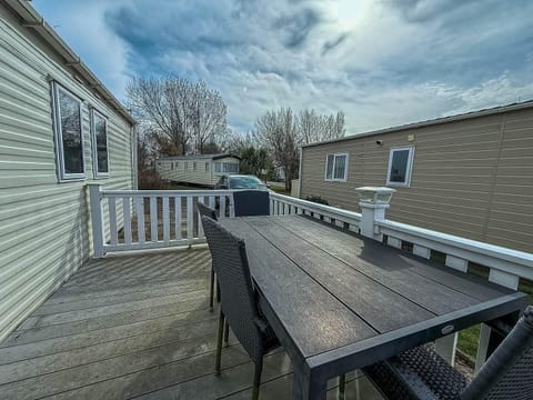 For your holidays 2026, enjoy the charm of Skegness Lincolnshire United Kingdom with a family caravan holiday at Southview Holiday Park Lincolnshire, featuring outdoor decking for relaxing evenings.