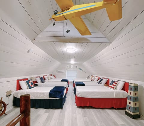 The loft with 8 twin beds (kids’ favorite)