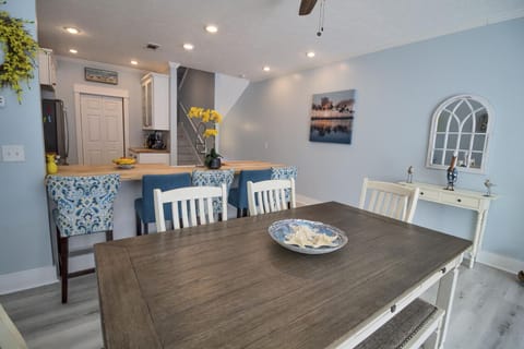 The dining area with seating for 10 including the breakfast bar.