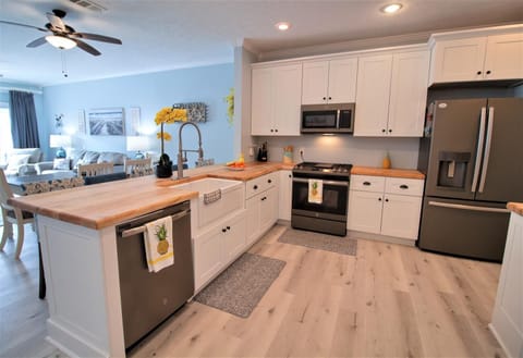 Spaceous kitchen with top of the line stainless appliances and everything you need to prepare a family dinner or quick bite for lunch.