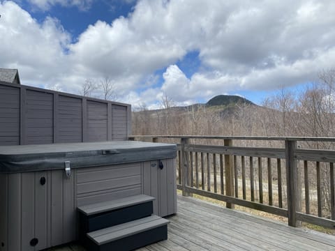 Main level deck and 7 person hot tub