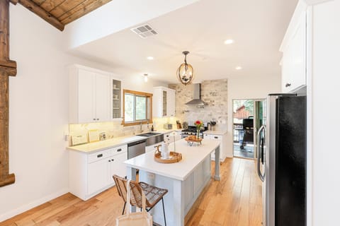 Fully-equipped kitchen with a full suite of modern appliances and tons of counter space.