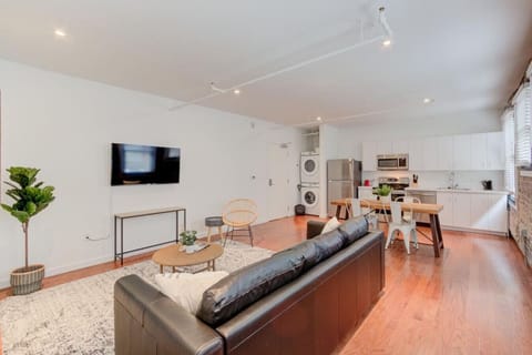 The apartment has a spacious living area.  A comfy sitting spot.  A table to enjoy a tasty meal, have a coffee, or get some work done. Reap the daily benefits of natural light and enjoy the “sunshine vitamin”.