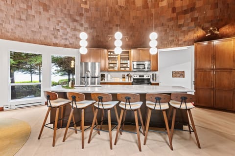 Bar seating and kitchen with a view