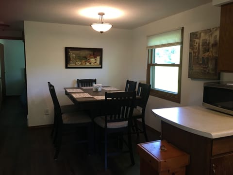 High top kitchen table seats 6 comfortably.