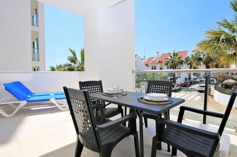 Large balcony with extra dining area outside for four guests
