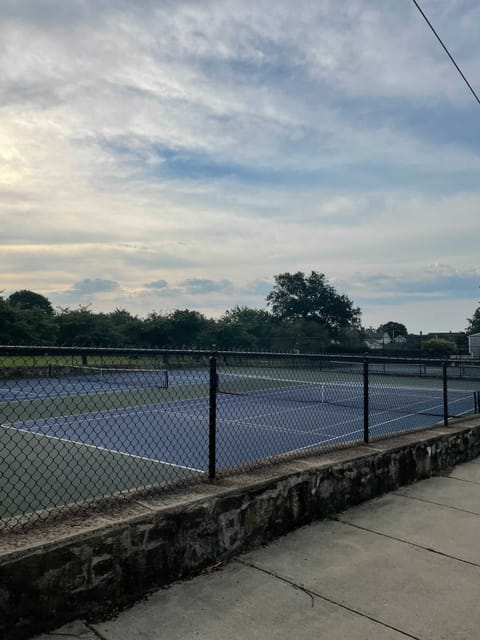 A public tennis court 0.2 miles away from the house.