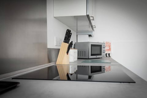 Kitchen: Sleek counters and modern appliances await your culinary adventures in style!