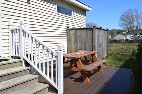 Pocket yard has a picnic table, grill, and enclosed outdoor shower.