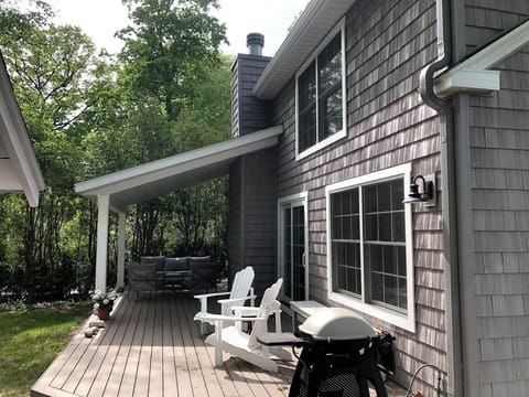 Deck - open portion with Adirondack chairs and grill