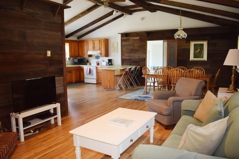 Adjacent to dining area and kitchen.