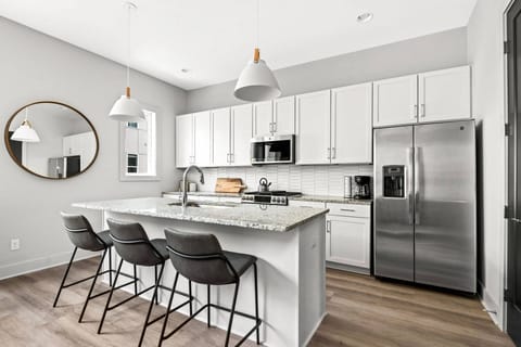 Two Separate Chef's Kitchens (One in Each Unit)