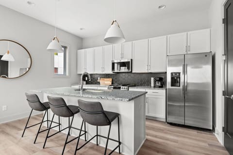 Two Separate Chef's Kitchens (One in Each Unit)